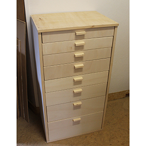 photo d'un meuble à tiroirs en bois de récupération